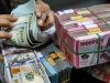 Rupiah Merosot saat Pasar Khawatirkan Ekonomi AS